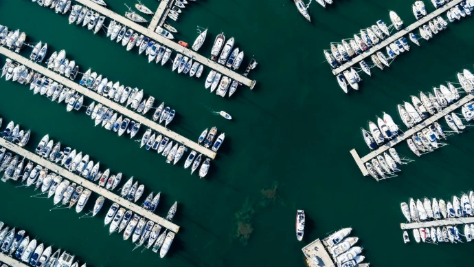 white boats on docking station